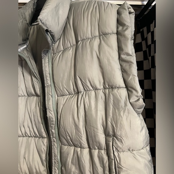 In a bubble puffer vest - Picture 3 of 4